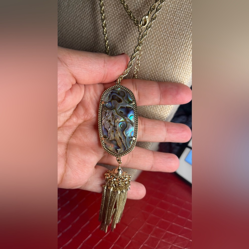 Kendra Scott Gold Layered Necklace with Iridescent Abalone Pendant and Tassel - Picture 3 of 9